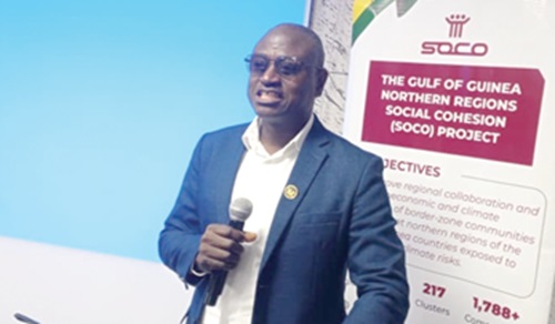 Ibrahim Tia (inset), North-East Regional Minister, addressing the participants 