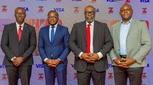 Clifford Mensah (left), Executive Director, Zenith Bank (Ghana) Ltd, with Fabrice Konan (right), Country Manager, Visa Ghana, and other dignitaries after the event