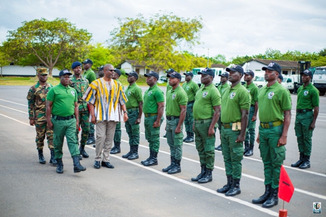 Courage Nunekpeku MD of TDC Ghana Ltd inspecting a parade during the passing out ceremony Courage Nunekpeku MD of TDC Ghana Ltd inspecting a parade during the passing out ceremony