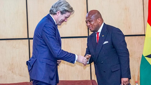 Samuel Okudzeto Ablakwa (right), Minister of Foreign Affairs, exchanging pleasantries with Foort van Oosten, Minister of Justice and Security of the Kingdom of the Netherlands