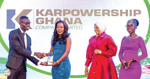 Sandra Amarquaye (2nd from left), Corporate Communications Manager, Karpowership Ghana, receiving her award from Bernard Avle, host of the Citi Breakfast Show