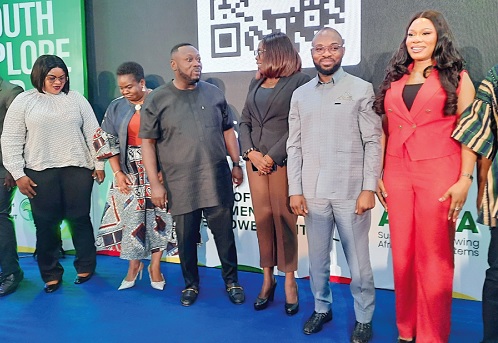George Opare Addo (3rd from left), Minister of Youth Development and Empowerment, interacting with Emma Ofori Agyemang (3rd from right), Chief Director, Ministry of Youth Development and Empowerment. Looking on are Osman Ayariga  (2nd from right), CEO, National Youth Authority, Dr Betty Annan (2nd from left), Country Director, AGRA, and other officials of the ministry. Picture: ERNEST KODZI