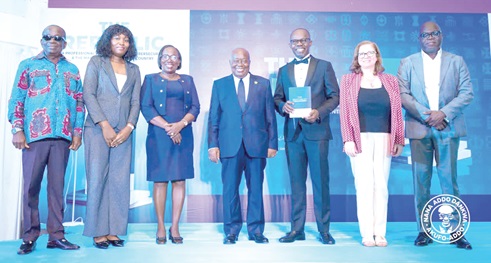 Former President, Nana Addo Dankwa Akufo-Addo (4th from left) and Dr Albert Antwi-Boasiako (3rd from right), author of the book, with other dignitaries at the event