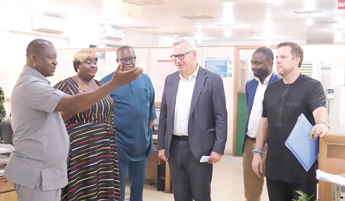 Samuel Doe Ablordeppey (left), News Editor, Daily Graphic, explaining the process of news production to Rune Skinnebach (3rd from right), EU Ambassador to Ghana; Jonas Claes (right), Deputy EU Ambassador to Ghana, and Abdul-Kudus Hussein (2nd from right), Press and Information Officer at the EU Office in Ghana, during their visit. With them is Theophilus Yartey (3rd from left), Editor, Graphic, and Mary Mensah, Foreign News Editor, Daily Graphic. Picture: EDNA SALVO KOTEY