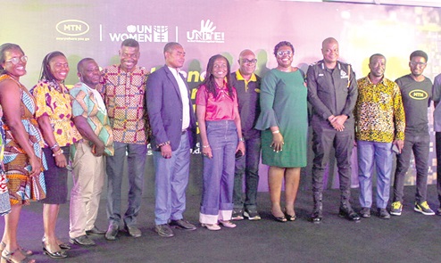 Adwoa Wiafe (middle), Chief Corporate Services and Sustainability Officer of MTN, with ACP Owusuwaa Kyeremeh (4th from right), DCOP Benjamin Addae (3rd from right) and other dignitaries after the event. Picture: CALEB VANDERPUYE