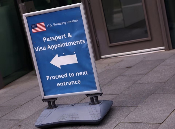  An information sign for passport and visa appointments is displayed outside the U.S. embassy in London, Britain, May 29, 2025. REUTERS/Hannah McKay