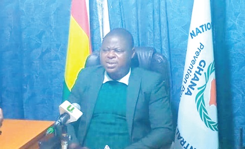 Dawoid Mensah, Central Regional Director of NADMO, addressing the media