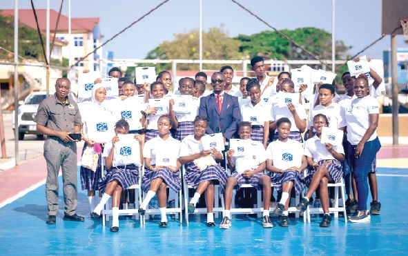 • School Children displaying some of Ghandour Cosmetics products