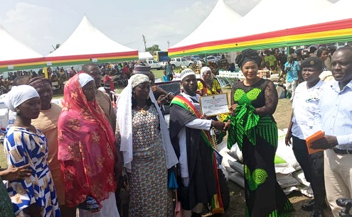 Ebi Bright (2nd from right), MCE for Tema, presenting the prize for Overall Best Farmer for Tema to Ali Yunusah Halifa. Picture: Benjamin Xornam Glover