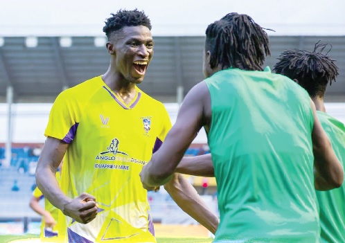 • Medeama’s Salim Adams is joined by his teammates to celebrate his winning goal during yesterday’s game