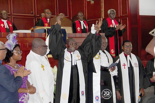 Rev David Aboagye-Danquah (middle), 14th Clerk of the General Assembly of the Presbyterian Church of Ghana, being introduced to the congregation during his induction service by Rt Rev Dr Abraham Nana Opare Kwakye (2nd from right), Moderator of the pcg General Assembly, and Rt Rev. Prof. Joseph Obiri Yeboah Mante (left), the immediate past Moderator