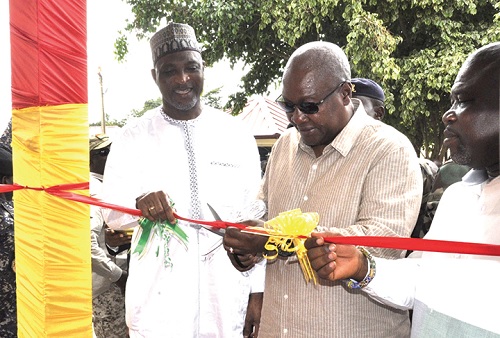 President John Mahama (inset) flanked by Mohammed-Mubarak Muntaka (left), Minister for the Interior, and James Gunu, Volta Regional Minister, while performing the inaugural ceremony