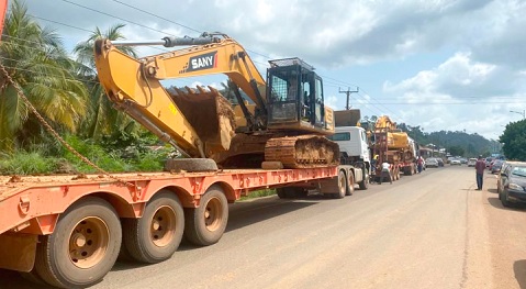Seized excavators being conveyed by NAIMOS for safe keeping