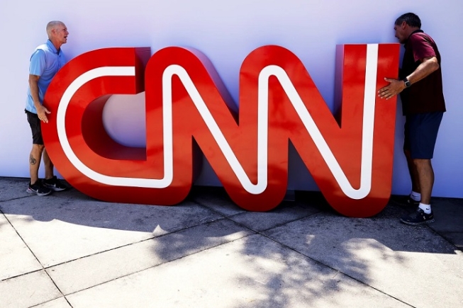 President Donald Trump criticized CNN amid a proposed merger between Netflix and Warner Bros. Discovery, the cable news network's parent company. Kevin Dietsch / Getty Images file