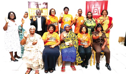 Mery Wood (seated 2nd from right), President, Zonta Club II, with ACP Owusuwaa Kyeremeh (standing 4th from right, Director, Domestic Volence and Victim Support Unit; Henry Ekuban (standing 3rd from right, Deputy Director, Ministry of Gender, Children and Social Protection; Dr Adolf Awuku Bekoi (standing 3rd from left, Coordinator of Domestic Volence Coalition, and some members of the club. Picture: Elvis Nii Doi Dowuona