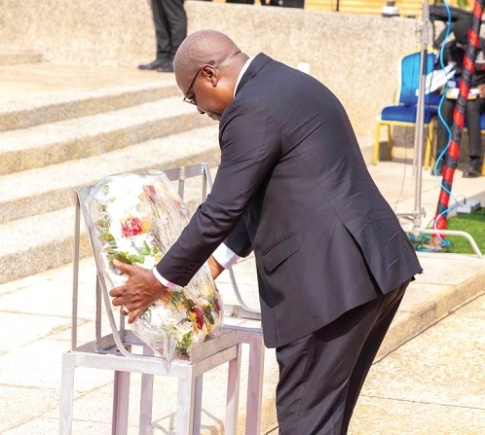President John Dramani Mahama laying  a wreath in tribute to the fallen officers