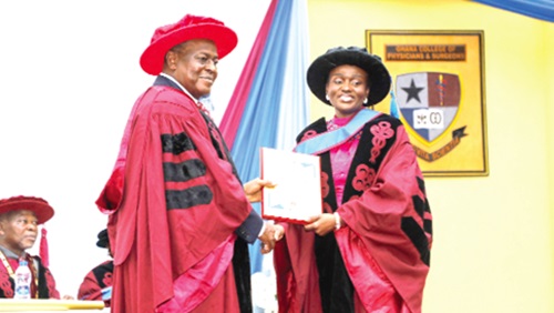 Newly inducted Fellows and members of the Ghana College of Physicians and Surgeons. INSET: Dr Dorothea Akosua Amoh, receiving the Best Senior Resident Award of Faculty of Radiology from Prof. Enyonam Yao Kwawukume (left), Council Chair, Ghana College of Physicians and Surgeons. Picture: ELVIS NII NOI DOWUONA 