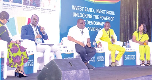 Dr Jamal Seidu Tonzua (2nd from left), Deputy Director-General of the Cyber Security Authority, speaking during the panel discussion. With him are Kalie Sillah (middle), Regional Coordinator for Research and Action at the West Africa Network for Peace Building, Kwadwo Kyei Yamoh (2nd from right); Executive Director of HELP Foundation Africa, Priscilla Ahiada Adogo (right) from Strategic Youth Network and Development in Africa, and the moderator. Picture: ESTHER ADJORKOR ADJEI.