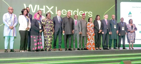 Sector ministers and dignitaries with President John Dramani Mahama (arrowed) after the opening ceremony.