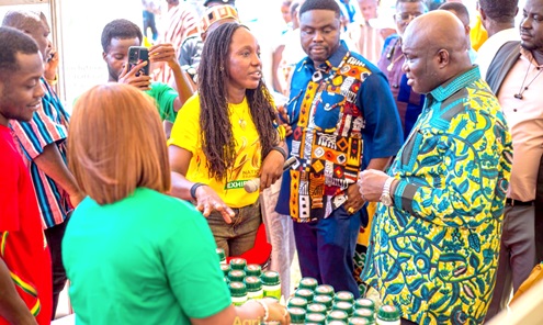 Alberta Nana Akyaa Akosa (3rd from right), Executive Director of Afrihouse Foundation, explaining a point to Eric Opoku (right), Minister of Food and Agriculture