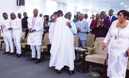 Dr Joseph Siaw Agyepong, Executive Chairman, Jospong Group, in a warm embrace with Julius Debrah, Chief of Staff. With them include Bernard Ahiafor (3rd from left), 1st Deputy Speaker of Parliament, Sam George (left), Minister of Communication, and Adelaide Siaw Agyepong (right), CEO, Asian-African Consortium