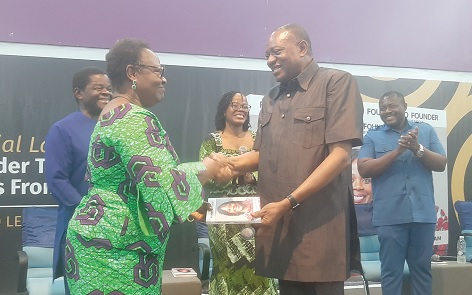 Dr Abdul-Rashid Hassan Pelpuo presenting a copy of "Founder to Founder" to Helena Ansa-Asare (left), mother of the author. With them are Kwaku Ansa-Asare (left), former Director of the Ghana School of Law and Founder of MounCrest University College; Irene Ansa-Asare Horsham (3rd from left), author of "Founder to Founder"; and Johnson Opoku-Boateng, Founder and CEO of QA Consult. Picture: ESTHER ADJORKOR ADJEI