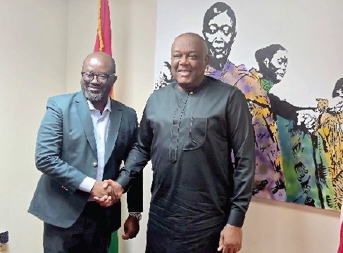 • Victor Smith (right), Ghana’s Ambassador to the US, in a handshake with Kurt Simeon-Okraku, GFA President