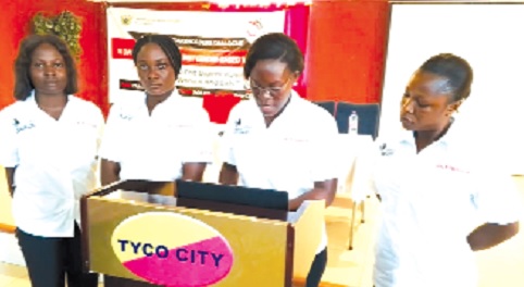 Theresa Mawuena (2nd from right), Secretary for the Young Urban Women's Movement, reading a communiqué issued at the end of the dialogue