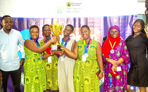 The winning debate team with staff of Ashaiman SHS
