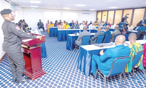 Christian Tetteh Yohuno (standing left), Inspector General of Police, addressing the Regional Crime Officers Conference 