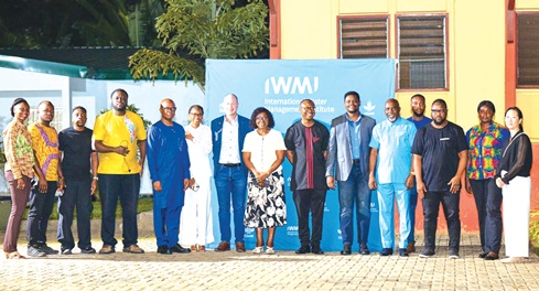 Staff of IWMI with representatives from Farmerline, Pumptech and other stakeholders­