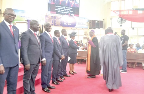 Most Rev. Professor Johnson Kwabena Asamoah-Gyadu (holding pastoral staff), Presiding Bishop of The Methodist Church Ghana, and other Connexional executives of the church, congratulating the newly inducted Connexional executives of the Fellowship of Methodist Evangelists