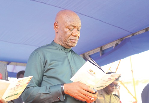 Kwasi Agyei (left),  Controller and Accountant-General, speaking during the End of Year Thanksgiving Service