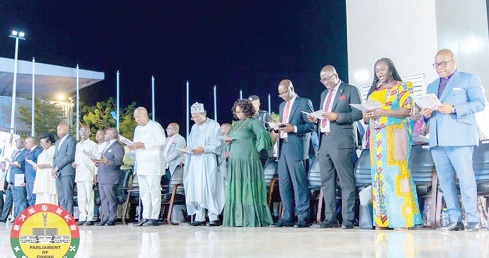 Rev. Stephen Wengam (right) in the company of President John Dramani Mahama (7th from right), Alban Bagbin (6th from right), Speaker of Parliament, and other dignitaries during the service