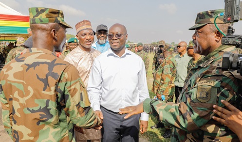 Dr Cassiel Ato Baah Forson (2nd from right), acting Minister of Defence, and Muntaka Mohammed-Mubarak (2nd from left), Minister for the Interior, thanking the security personnel for their services throughout the year. With them is Maj. Gen. William Agyapong (right), Chief of the Defence Staff, Ghana Armed Forces. Picture: ELVIS NII NOI DOWUONA 