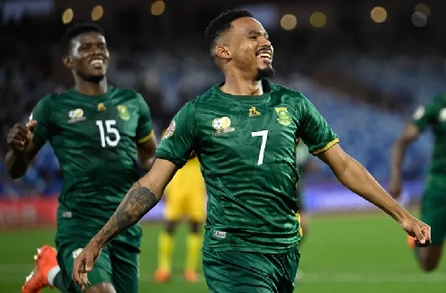 South Africa's Oswin Appollis celebrates scoring his team's winner from the penalty spot 