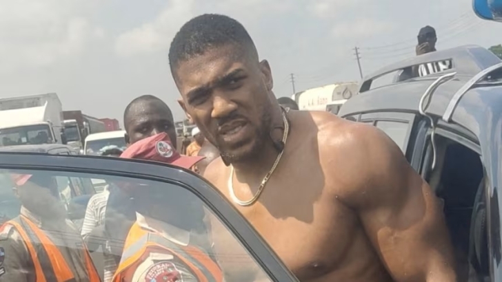 British boxer Anthony Joshua gets into an emergency responders' vehicle after being involved in a car crash in Ogun State, Nigeria December 29, 2025. Sodiq Ayo/Reuters