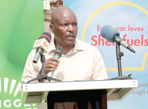 Kilai Muasya (left), Finance Manager, Vivo Energy Ghana, addressing pupils of La Enobal Basic School, at the inauguration of the washroom facility 
