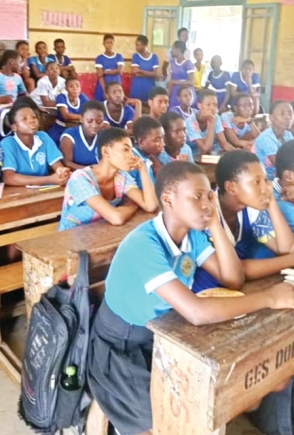 Some of the girls going through their lessons