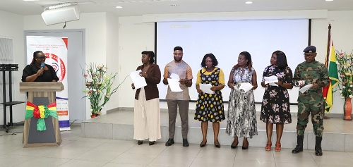 Nana Abena Owusu Omenyo (left) inducting the new executive into office