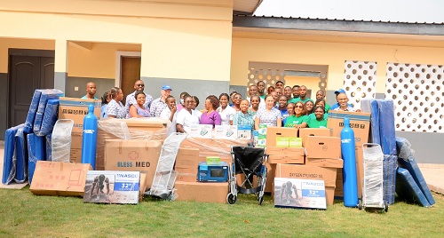 Officials of Flour Mills of Ghana Limited and Tema Polyclinic after the donation of medical supplies Officials of Flour Mills of Ghana Limited and Tema Polyclinic after the donation of medical supplies