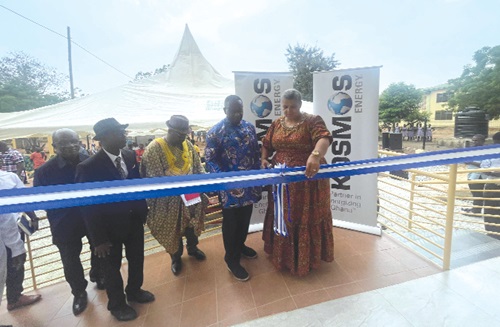 Joe Mensah (4th from left), Senior Vice-President & Head of Ghana Business Unit of Kosmos Energy Ghana, being assisted by Gizella Tetteh-Agbotui, Member of Parliament for Awutu Senya West, and the headmaster to inaugurate the clinic Joe Mensah (4th from left), Senior Vice-President & Head of Ghana Business Unit of Kosmos Energy Ghana, being assisted by Gizella Tetteh-Agbotui, Member of Parliament for Awutu Senya West, and the headmaster to inaugurate the clinic