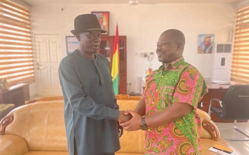 Donatus Akamugri Atanga (left), Upper East Regional Minister, exchanging pleasantries with Wisdom Ahadzi, Upper East Regional Director, GTA, during the meeting Donatus Akamugri Atanga (left), Upper East Regional Minister, exchanging pleasantries with Wisdom Ahadzi, Upper East Regional Director, GTA, during the meeting