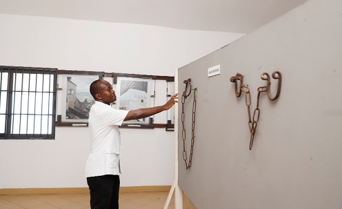 Mr Benjamin Afagbegee, Senior Conservator of Monuments explaining how the slave bounds were used