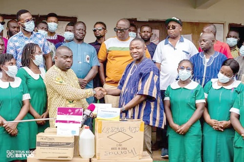 Prof. Titus Beyuo (3rd from right), MP for Lambusssie, handing over the items to Bin-eranaa Jerdu Nuhu, Lambussie District Director of Health Services. With them are some healthcare workers Prof. Titus Beyuo (3rd from right), MP for Lambusssie, handing over the items to Bin-eranaa Jerdu Nuhu, Lambussie District Director of Health Services. With them are some healthcare workers