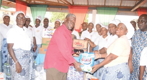 A representative of the inmates of the Weija Leprosarium receiving the items presented by the Women’s Society of the AME Zion Church A representative of the inmates of the Weija Leprosarium receiving the items presented by the Women’s Society of the AME Zion Church