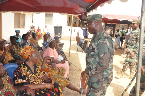Major General Charles Agyemang-Prempeh, Commandant of the Military Academy, wishing some of the patients speedy recovery