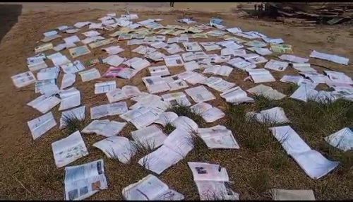 Learning materials being dried after the rainstorm at Assin Nuanua Fantse
