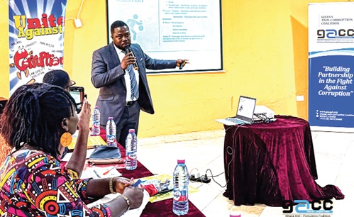Raphael Asamoah, an officer at the Financial Intelligence Centre, making a presentation at one of the training programmes in the Western Region Raphael Asamoah, an officer at the Financial Intelligence Centre, making a presentation at one of the training programmes in the Western Region