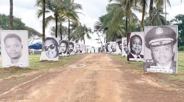 Photographs of murdered former officials displayed along a highway in Monrovia Photographs of murdered former officials displayed along a highway in Monrovia
